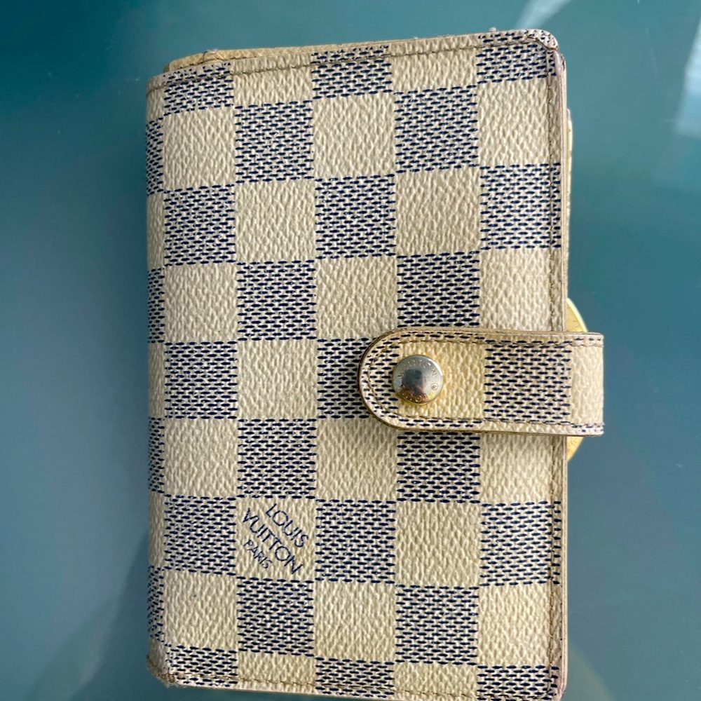 Authentic Louis Vuitton kisslock wallet in white monogram